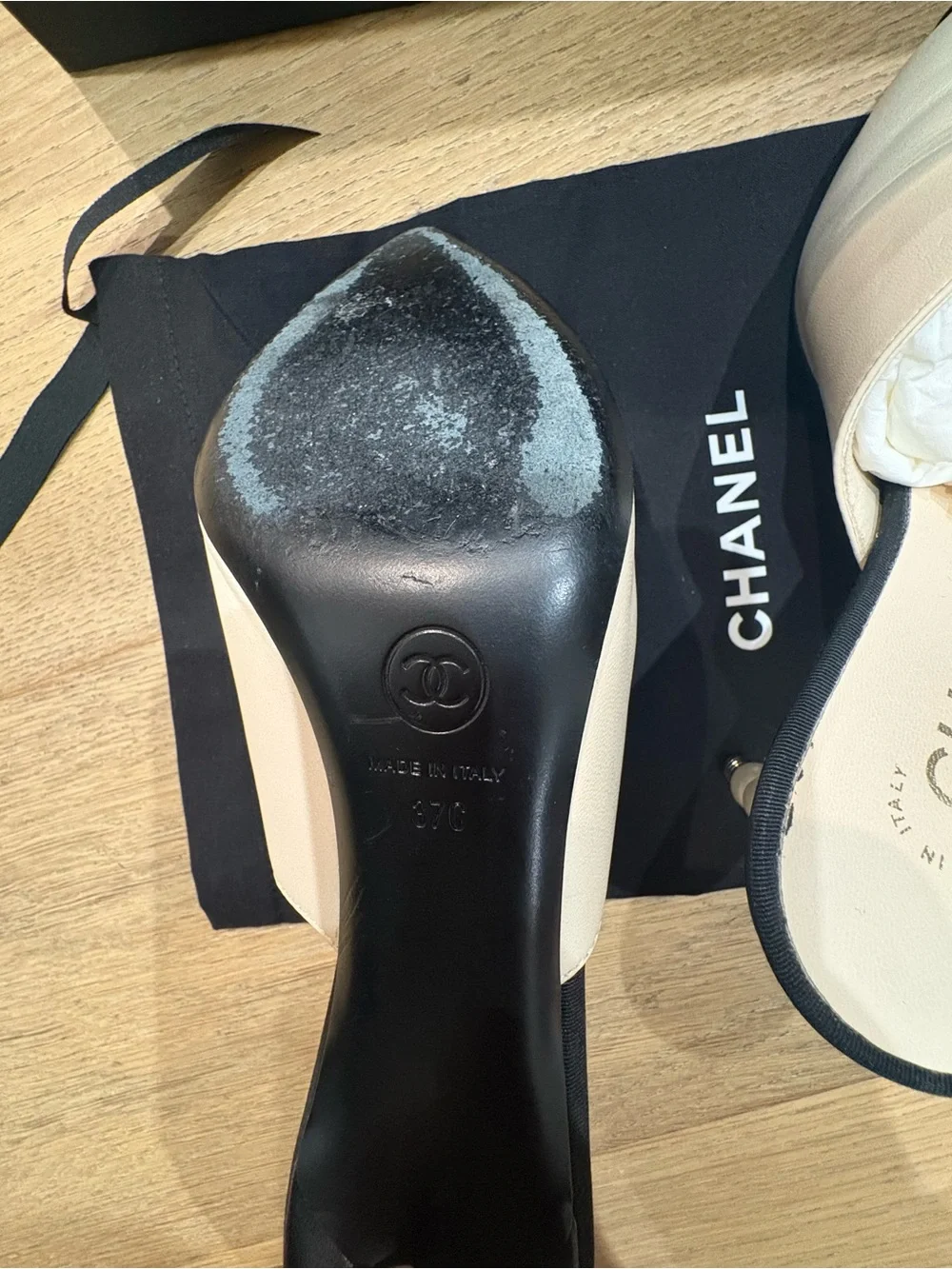 CHANEL Two-Tone Leather Mules with Pearl-Embellished Heel in White & Black